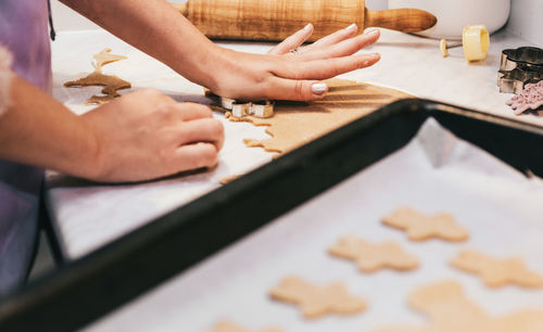 Baking christmas cookies at home. making gingerbread cookies.