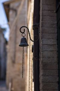 Ancient bell in the streets of the village in italy