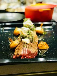 Close-up of food served on table