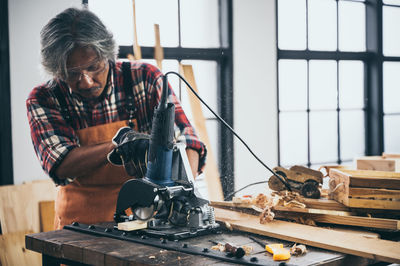 Man working on wood