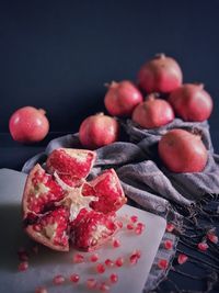 High angle view of strawberries on table against black background
