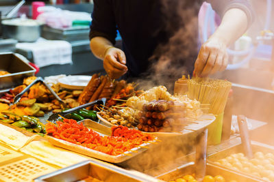 Close-up of person preparing food