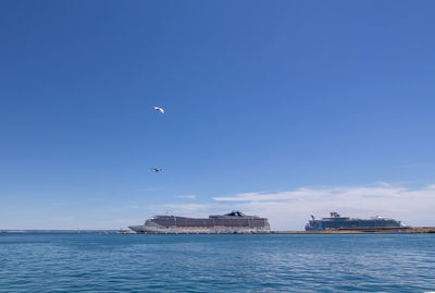 Scenic view of sea against blue sky