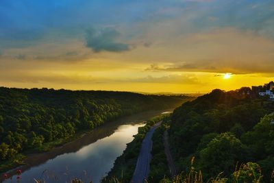 Scenic view of river against sky during sunset in the avonmouth. bristol