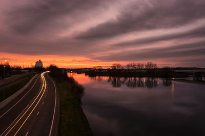 Panoramic view of road against sky during sunset