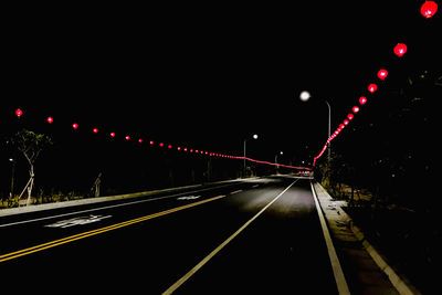 Light trails on road at night