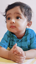 Portrait of cute boy looking away