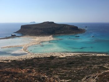 Scenic view of island against clear sky