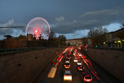 Ferris wheel against sky in city