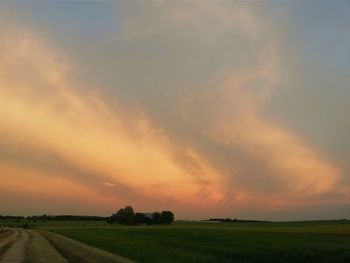 Scenic view of landscape at sunset