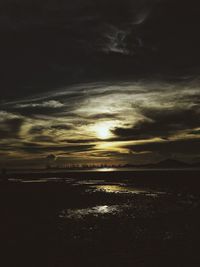 Scenic view of sea against dramatic sky