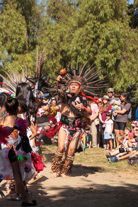 Crowd in traditional clothing during festival