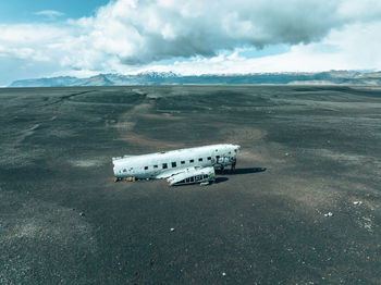 Aerial view of the old crashed plane abandoned on solheimasandur beach near vik,iceland.