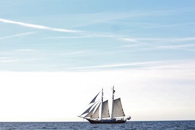 Boat at sea against sky