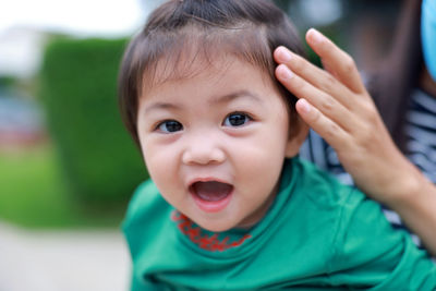 Portrait of a sweet tiny baby girl and her mother. smile of a lovely young lady. a contented family