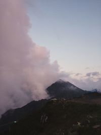 Scenic view of volcanic mountain against sky