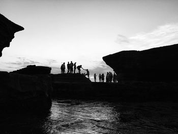 Group of people on rock