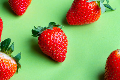 High angle view of strawberries on table