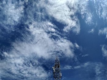 Low angle view of statue against blue sky