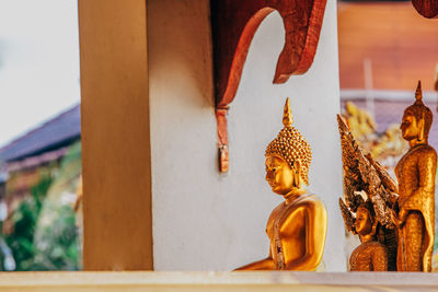 Low angle view of buddha statues in temple