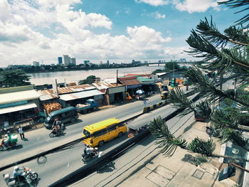 High angle view of vehicles on road in city