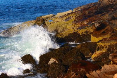 Waves splashing on rocks