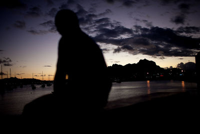 Silhouette of people at sunset