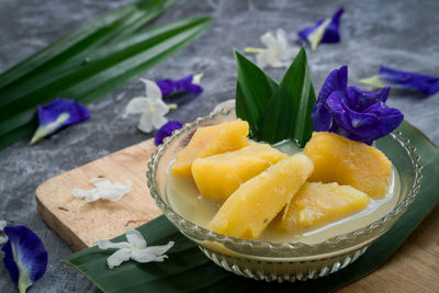 High angle view of fresh fruits in bowl on table