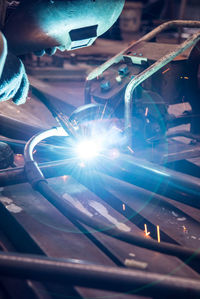 Close-up of worker working at factory