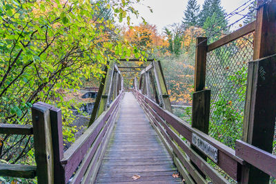 A walking bridge at tumwater falls park in washington state.