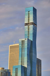 Low angle view of modern buildings against sky