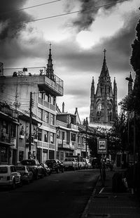 City street against cloudy sky