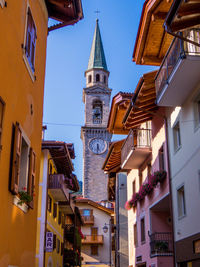 Low angle view of buildings against sky in city