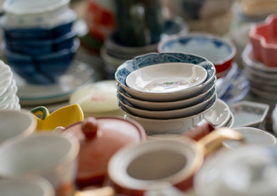 Close-up of tea cups on table