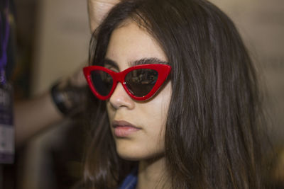 Close-up of woman wearing sunglasses