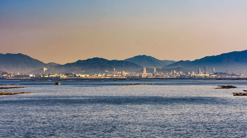 Scenic view of sea against sky during sunset