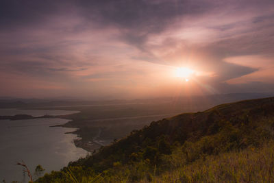 Scenic view of mountains against sky during sunset