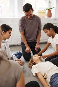 Teachers giving first aid training