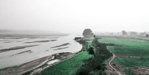 Scenic view of land against sky