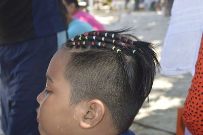 Close-up of boy with hairstyle