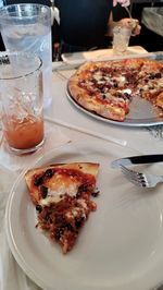 High angle view of pizza in plate on table