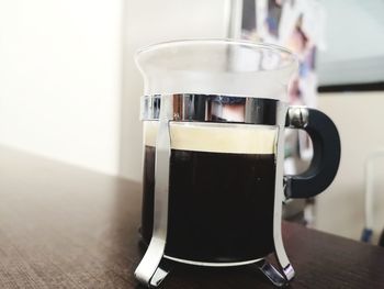 Close-up of coffee cup on table