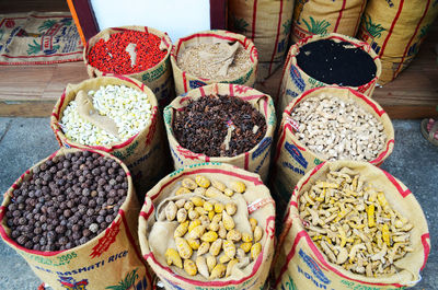 High angle view of various fruits for sale at market stall