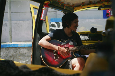 Man playing guitar