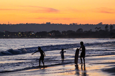 Scenic view of sea at sunset