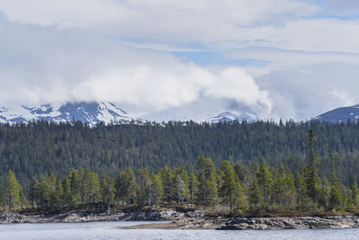 Scenic view of mountains against sky during winter