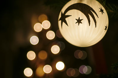 Close-up of illuminated christmas tree at night