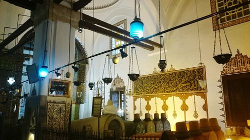Low angle view of illuminated hanging lights