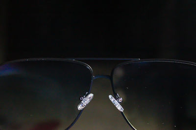 Reflection of sunglasses on glass