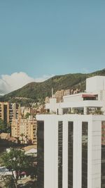 View of buildings against clear sky